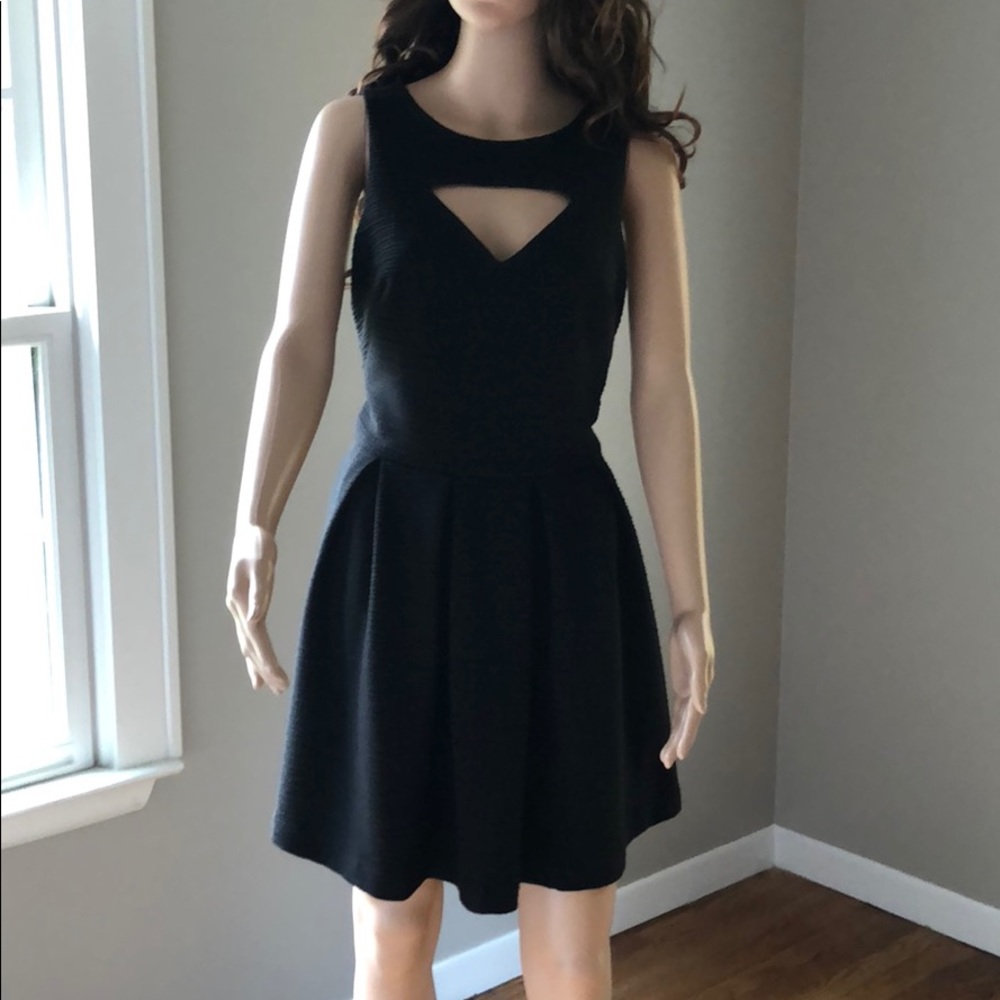 Fun flirty black cutout textured dress